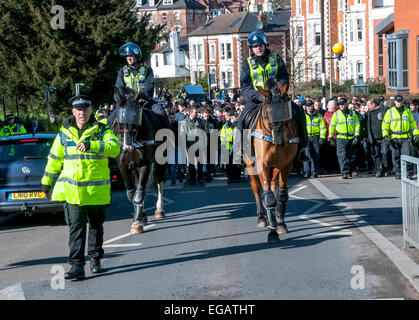 Devon and Cornwall Police escort Plymouth Argyle football fans along York Road during the police operation to prevent football violence at the League 2 football match between Exeter City FC and Plymouth Argyle FC on February 21st, 2015. Stock Photo