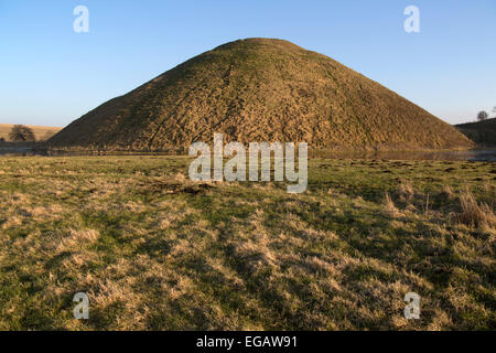 Silbury Hill mound, Wiltshire, England is the largest prehistoric manmade structure in Europe Stock Photo