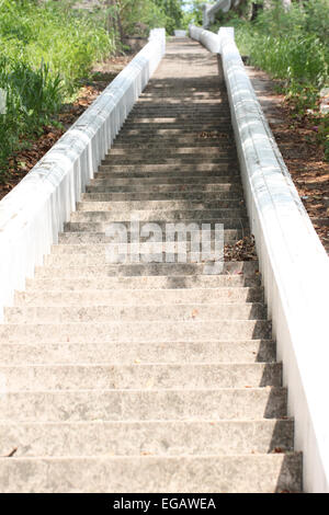 Stairs concrete up for the mountain to Thailand temple. Stock Photo