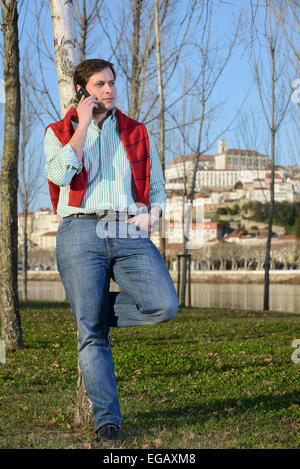 Young man talking on the phone Stock Photo