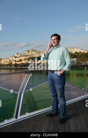 Young man talking on the phone Stock Photo