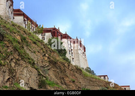 The back of the Potala Palace in Lhasa with a rock face in the front Stock Photo