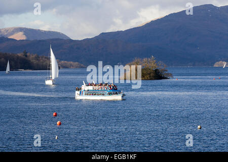 Lake Windermere, Cumbria, UK. 21st February, 2015.  Sunny cold day  tourists enjoy trips on the lake Credit:  Gordon Shoosmith/Alamy Live News Stock Photo