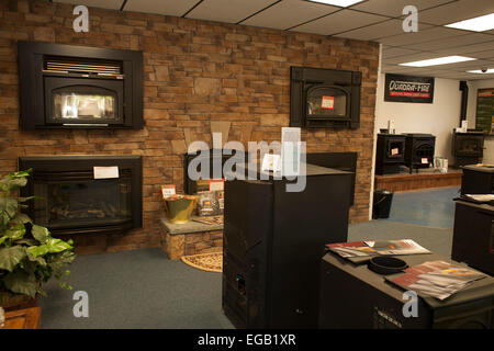 Stove and fireplace store has a variety of models for sale. Stock Photo
