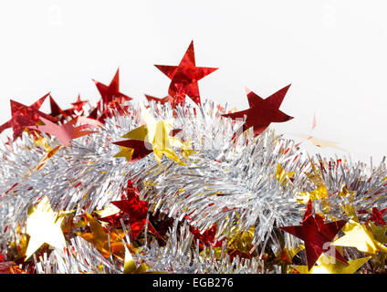 Tinsel silver with red stars Stock Photo
