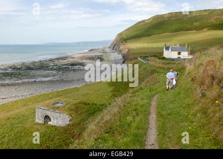 The Ceredigion Coastal Path at Wallog between Clarach and Borth on Cardigan Bay overlooking the beach and disused lime kiln. Stock Photo