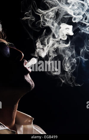 1 indian Business Man Smoking Cigarette Stock Photo