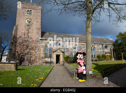 Minnie mouse in church gardens Stock Photo