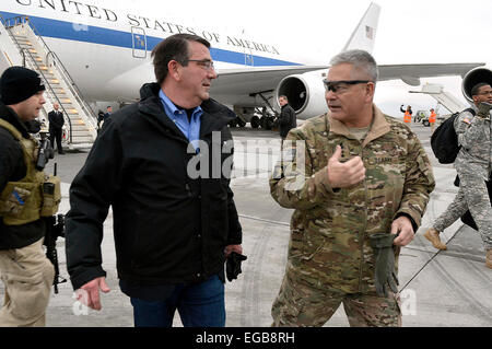 US Secretary of Defense Ashton Carter is greeted on arrival by Gen. John Campbell February 21, 2015 in Kabul, Afghanistan. Carter who was only just sworn in as the new Secretary made a surprise visit only days after taking up the post. Stock Photo