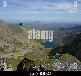 Looking down towards the Pyg track and Miners Paths, and Llyn Llydaw and Glaslyn lakes from near the top of Mount Snowdon. Stock Photo