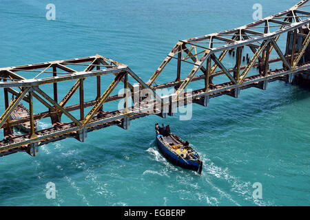 Fisherman Boat Crossing Pamban Bridge on Palk Strait at India Stock Photo