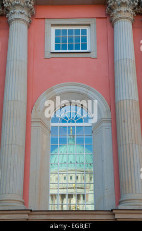Dome of St Nicholas Church, Potsdam, reflected in window of facade of Brandenburg Landtag regional parliament building Stock Photo