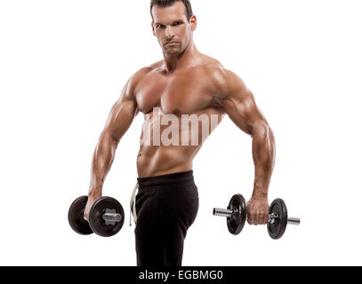 Muscle man in studio lifting weights, isolated over a white background Stock Photo