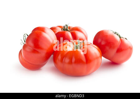 red tomatoes on white background Stock Photo