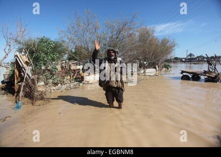 Gaza City, Gaza Strip, Palestinian Territory. 22nd Feb, 2015. A Palestinian Bedouin man makes his way despite the water in an area that is flooded after Israel opened the gates of a dam along its border with the Gaza Strip on February 22, 2015 in the village of al-Mughraqa, south of Gaza City. Palestinian authorities said the Israeli army opened the floodgates of a canal leading to central Gaza, causing the flooding of several Palestinian homes © Ashraf Amra/APA Images/ZUMA Wire/Alamy Live News Stock Photo