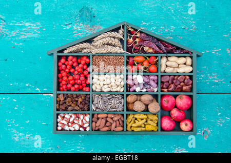 vegetarian healthy fruits, seeds and dried food ingredient collection in wooden box Stock Photo