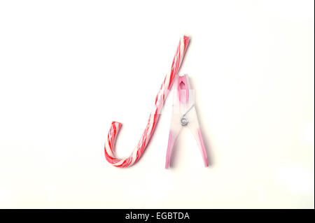 Candy cane and clothes peg, jpeg Stock Photo