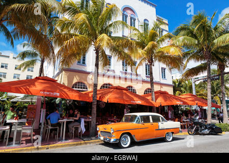 Art Deco building design on Ocean Drive, South Beach Miami, Florida, USA with a cafe restaurant below Stock Photo