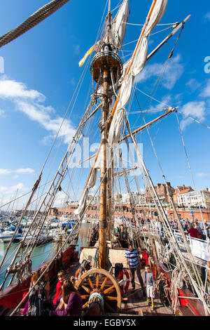 Replica Russian 1703 Frigate, Shtandart moored at Ramsgate. Deck view to the stern of the man-of-war with the ship's wheel and the mizzen mast. Stock Photo