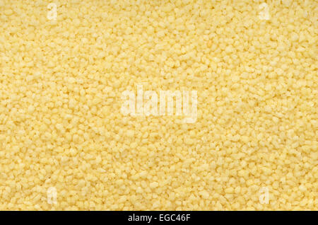 close up couscous grains background Stock Photo