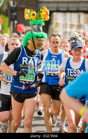Fun runners and charity runners taking part in the London marathon Stock Photo