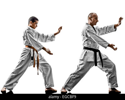 two karate men sensei and teenager student teacher teaching isolated on white background Stock Photo