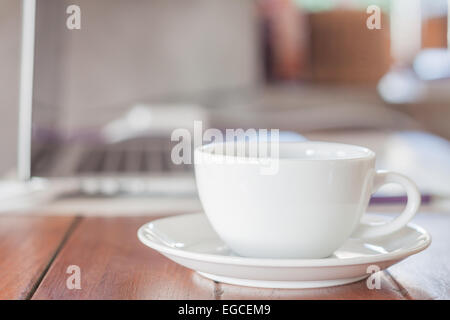 White coffee cup on work station, stock photo Stock Photo