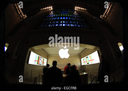 The Apple Logo, on the glass fronted Apple Store, surrounded by the high rise buildings of Manhattan, New York, USA. Stock Photo