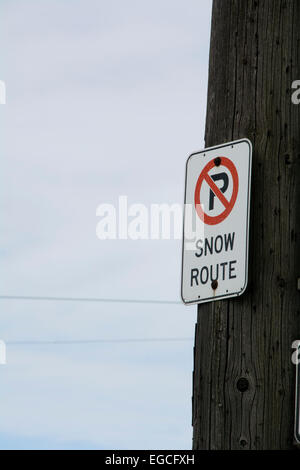 No parking sign indicating a snow route Stock Photo