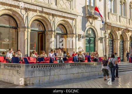 Tourists enjoying refreshments at one of the many restaurants in the old walled town in Dubrovnik, Croatia Stock Photo