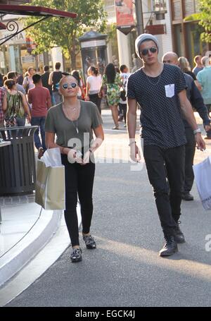 Alli Simpson shopping at The Grove in Hollywood with a male companion Featuring: Alli Simpson Where: Los Angeles, California, United States When: 20 Aug 2014 Stock Photo