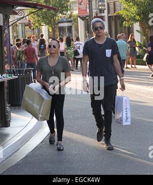 Alli Simpson shopping at The Grove in Hollywood with a male companion Featuring: Alli Simpson Where: Los Angeles, California, United States When: 20 Aug 2014 Stock Photo