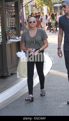 Alli Simpson shopping at The Grove in Hollywood with a male companion Featuring: Alli Simpson Where: Los Angeles, California, United States When: 20 Aug 2014 Stock Photo