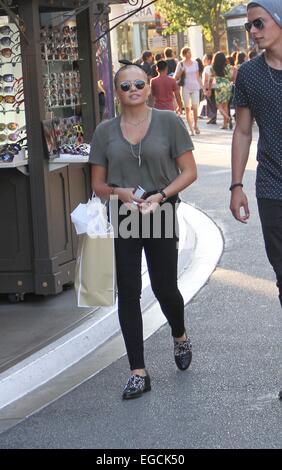 Alli Simpson shopping at The Grove in Hollywood with a male companion Featuring: Alli Simpson Where: Los Angeles, California, United States When: 20 Aug 2014 Stock Photo