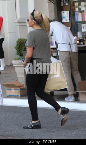 Alli Simpson shopping at The Grove in Hollywood with a male companion Featuring: Alli Simpson Where: Los Angeles, California, United States When: 20 Aug 2014 Stock Photo