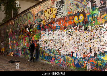 Artist at The Lennon Wall in Prague. Stock Photo