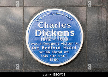 A blue plaque in Brighton commemorating the stay of Charles Dickens at the Bedford Hotel. Stock Photo