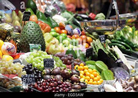 Exotic brightly colored fresh fruit for sale, Boqueria Market, La Rambla, Barcelona, Spain Stock Photo