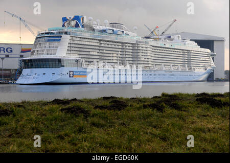 Papenburg, Germany. 22nd Feb, 2015. The cruise liner 'Anthem of the Seas' undocks from the Meyer Shipyard in Papenburg, Germany, 22 February 2015. The cruise liner measures 347, 75 metres and 41, 4 metres width and offers enough space for 4.188 passengers. It is one of the largest ever build vessels in Germany. Photo: Ingo Wagner/dpa/Alamy Live News Stock Photo