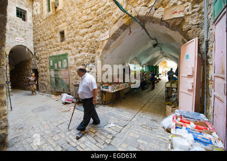 HEBRON, ISRAEL - 10 OCT, 2014: Street with bazaar and shops in the center of the old city Hebron Stock Photo