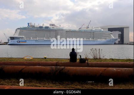 Papenburg, Germany. 22nd Feb, 2015. The cruise liner 'Anthem of the Seas' undocks from the Meyer Shipyard in Papenburg, Germany, 22 February 2015. The cruise liner measures 347, 75 metres and 41, 4 metres width and offers enough space for 4.188 passengers. It is one of the largest ever build vessels in Germany. Photo: Ingo Wagner/dpa/Alamy Live News Stock Photo