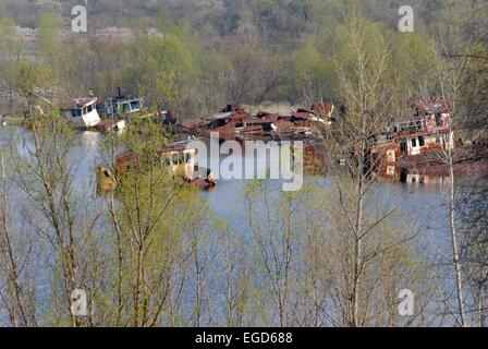 Nuclear incident of Chernobyl, abandoned fluvial port on Prypiat river in contaminated area of 30 kilometers around the place Stock Photo
