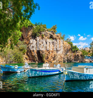 Boats on Lake Voulismeni. Agios Nikolaos, Crete, Greece Stock Photo
