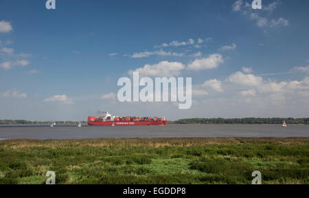 Container ship Santa Rosa from the shipping company Hamburg Sued on the Elbe near Stade, Hamburg, Germany Stock Photo