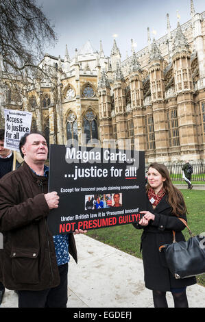 Westminster, London, UK. 23rd February, 2015. Hundreds of lawyers, trade unionists and campaigners gathered for the 'Not The Global Law Summit' rally outside Parliament today in protest at the government’s ongoing cuts to legal aid. Credit:  Gordon Scammell/Alamy Live News Stock Photo