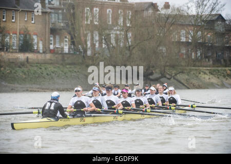 London, UK. 22nd February, 2015. Oxford University Women's Boat Club (OUWBC) [white hull] vs Molesey Boat Club (MBC) [yellow hull] - Pre Boat Race practice fixture.   Location:- River Thames, London, United Kingdom between Putney (start) and Mortlake.   In the final preparations for The BNY Mellon Boat Races, each of the four clubs will pit themselves against some of the best domestic and international competition. Credit:  Duncan Grove/Alamy Live News Stock Photo