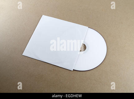 Blank compact disk on a table. Template for branding identity for designers. Stock Photo