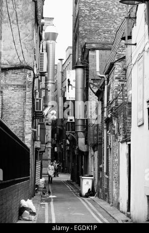 Black and white picture of a back alley in Manchester England Stock Photo