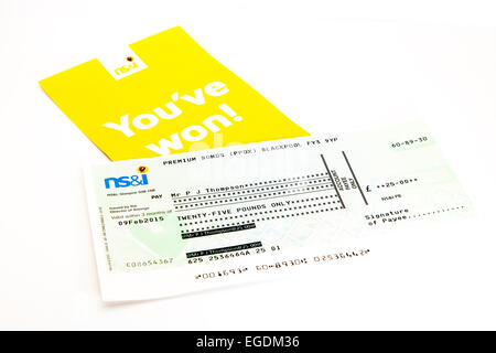 Premium bond win bonds winner cheque winners check national savings & investments investment payment Stock Photo