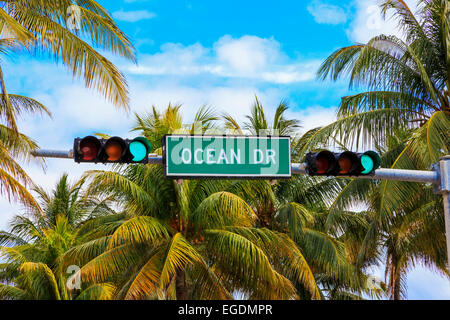 Ocean Drive road sign hanging  over the highway on South Beach, Miami, Florida, USA Stock Photo